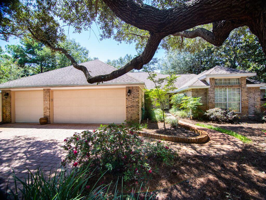 Prepare to fall in love with this all brick, 3 car garage home on a private .39 acre lot in the gated neighborhood of Windward. This impeccably maintained home is perfect for entertaining. The family room and kitchen are open to one another and overlook the private backyard. There is also a large formal living room and dining room open to one another. Hollywood doors give a grand entrance into your oversized master bedroom suite with high-end master bath with tile shower and soaking tub. Three other bedrooms are on the other side of the home with one serving as an office with a built in desk currently. There is also a delightful sun room off of the family room that would make a wonderful play room or art studio. Enjoy Florida living on your massive screened porch. Measurements are approx.
