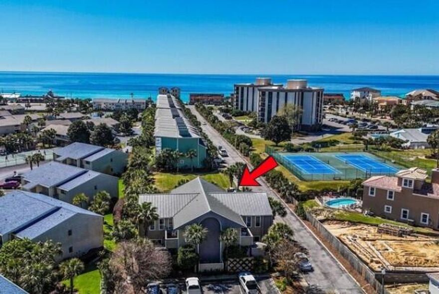 Prepare to be captivated by this coastal treasure! As the most affordable home in Beach Pointe, it boasts a DEEDED BEACH just a quick 2/10ths of a mile from your front door--perfect for endless seaside adventures! The home features two inviting bedrooms, including one with two full-sized beds plus a trundle for extra sleeping arrangements, and a luxurious king-sized bed with a custom headboard in the other. Each bedroom enjoys the convenience of its own en-suite bathroom, along with an additional half-bath conveniently located on the first floor. A fully stocked kitchen where modern stainless steel appliances await your culinary creations conveys with the sale. The den is designed for relaxation, featuring a pullout sofa adorned in calming coastal decor. You'll appreciate the brand-new vinyl plank flooring upstairs, paired with stylish ceramic tile on the first floor ideal for keeping sand at bay after beach outings.
Venture outside to your private courtyard, where you can unwind and rinse off in the outdoor shower after a day under the sun. An oversized outdoor closet provides ample storage space for all your beach gear. Plus, when the ocean isn't calling, you'll love having the community pool practically at your doorstep! This coastal cottage is the ultimate retreat, perfect for year-round living, weekend getaways, or as a lucrative short-term rental investment. Don't miss your chance to make unforgettable memories in this charming beach homeit's waiting just for you!
