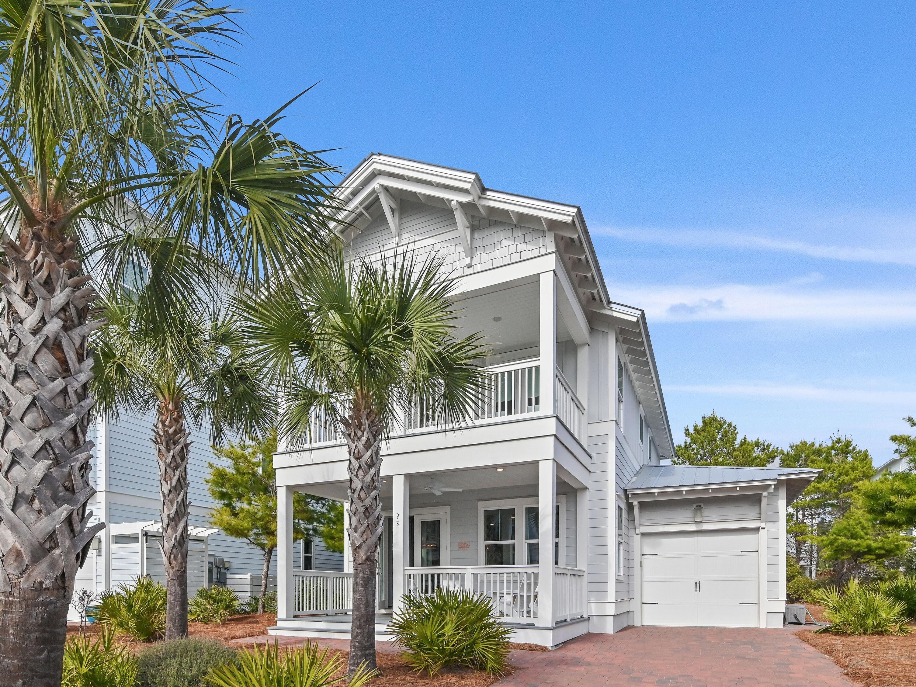 Welcome to 93 E Crabbing Hole Lane - A Relaxed Beachside Retreat.Nestled in a quiet Inlet Beach neighborhood, this 4-bedroom, 3.5-bathroom home offers a comfortable blend of modern convenience and coastal charm. Built in 2019 and spanning 2,162 square feet, this well-designed home provides an easygoing lifestyle just minutes from the white sandy beaches and everything 30A has to offer.Inside, an open and airy floor plan welcomes you with plenty of natural light and a color palette that complements the coastal surroundings. The kitchen is well-equipped with high-quality appliances, custom cabinetry, and a spacious prep area, making it just as suited for everyday meals as it is for hosting friends and family. The primary suite serves as a quiet retreat, featuring a large en-suite bathroom with dual vanities and a glass-enclosed shower. Three additional bedrooms provide flexibility for guests or family.

Designed for enjoying the indoor-outdoor lifestyle, this home offers multiple outdoor spaces, including a covered patio perfect for casual meals and an expansive balcony where you can relax and enjoy the peaceful setting.

Located close to pristine beaches, boutique shopping, and a variety of dining options, 93 E Crabbing Hole Lane offers the best of Inlet Beach living. Whether you're looking for a personal getaway or a great rental opportunity, this home provides a comfortable, well-located retreat in one of 30A's most desirable areas.

This first level has living, dining, the kitchen and the primary suite.  The second level has a work area along with three additional bedrooms for comfortable evenings.