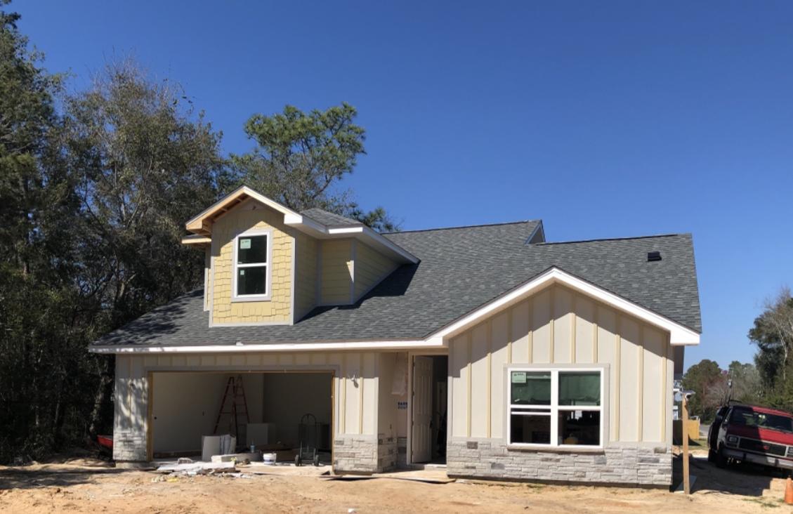 New Construction! Expected completion date is April 2021. A four bedroom two and a half bath home with modern finishes, downstairs master, second sitting area upstairs, open floor plan, large walk-in storage area that is completely finished with both heating and air conditioning, close to Hurlburt's back gate and is an easy commute to Eglin is ready to be your new home. The walk-in storage area is NOT included in the Sq. Footage and is approx. 11'8'' x 14'. Sleek European style cabinets paired with quartz in the kitchen and the three baths are simply a cut above other homes. The master bath has a walk-in shower, free standing soaker tub, double vanity and a water closet. A tankless hot water heater will ensure plenty of hot water. The exterior of the home has not yet been painted.