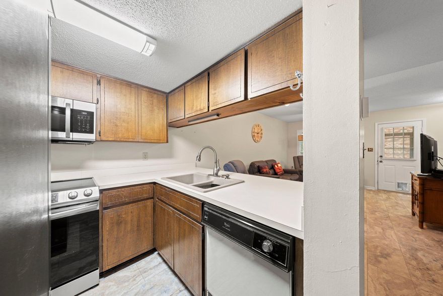 Discover the charm of this delightful one-bedroom end unit townhouse nestled in a prime area, just a few minutes away from shops and the breathtaking emerald coast beaches. With its inviting open living space, natural light, and new kitchen appliances, this townhouse seamlessly combines comfort and practicality. The bedroom serves as a tranquil sanctuary, while the two screened-in patios offer an ideal spot to unwind.