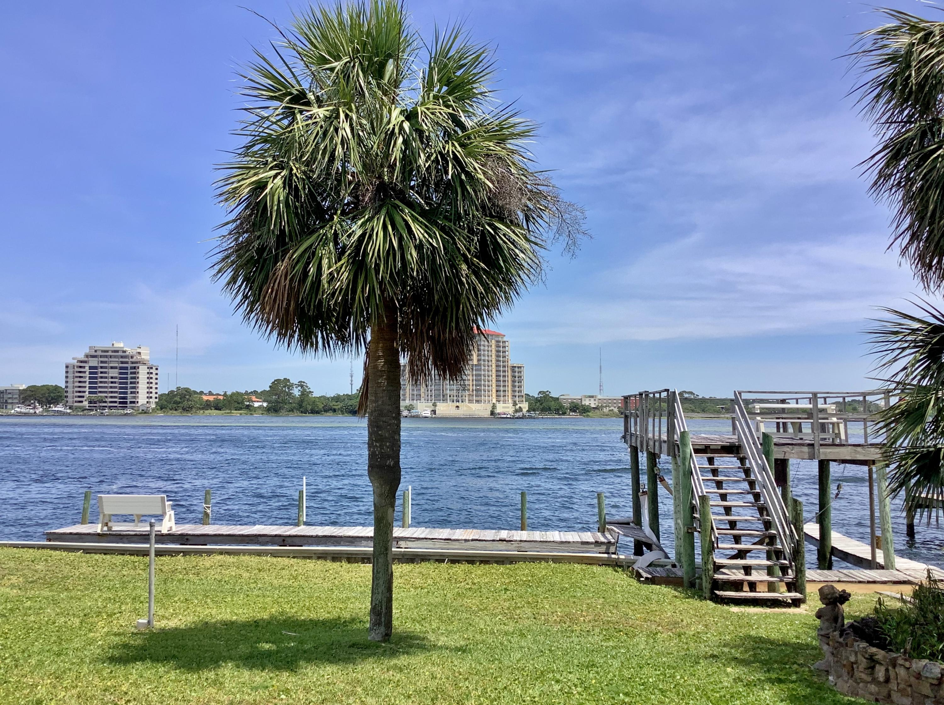 The BEST DEAL on the WATER!! MILLION Dollar Views! Endless Possibilities! 81 feet on the beautiful Intercoastal Waterway. Just a short stroll to the Beach. Locations like this do NOT come around often! This home has great bones and will make an EXCELLENT renovation, or bring your builder and build the waterfront home you've always dreamed of! Selling ''As Is'', but has a dock, with upper deck, boatlift, Sauna inside Master bathroom. Master has a wonderful 12x13 sitting room with deep walk in closet. Home is tiled throughout, and has 2 skylights that let the Sunshine In! Lawn pump, sprinkler system, and well, plus an over sized 2 Car Garage. Come and make your dreams of living on the water a REALITY. Bring your Boat and Bring your OFFER!