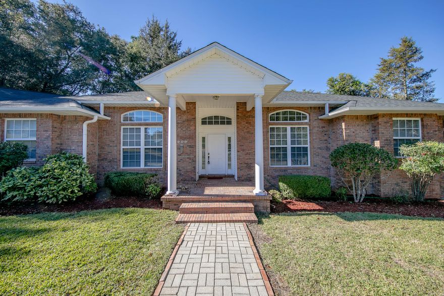 Just Listed ! Brand NEW roof Nov 2021 ! Impressive 4 bedroom 3 full bath home in south Crestview. With a panoramic LAKE view this home is situated nicely on a nearly half acre cut de sac lot in a family neighborhood. The open family room with high ceilings and built ins has a large gas fire place. Pull out shelves in kitchen cabinets. Off the kitchen/family room area is a balcony style porch with retractable awning overlooking the backyard views. The bedrooms are split with 2 on one side of the house and 2 on the opposite side. The large Master bath has His and Hers sinks and a garden tub. Down near the lake is an additional large shaded deck area for relaxing or entertaining. Other amenities include central vacuum system, spacious laundry room, oversized garage. Must see to appreciate.