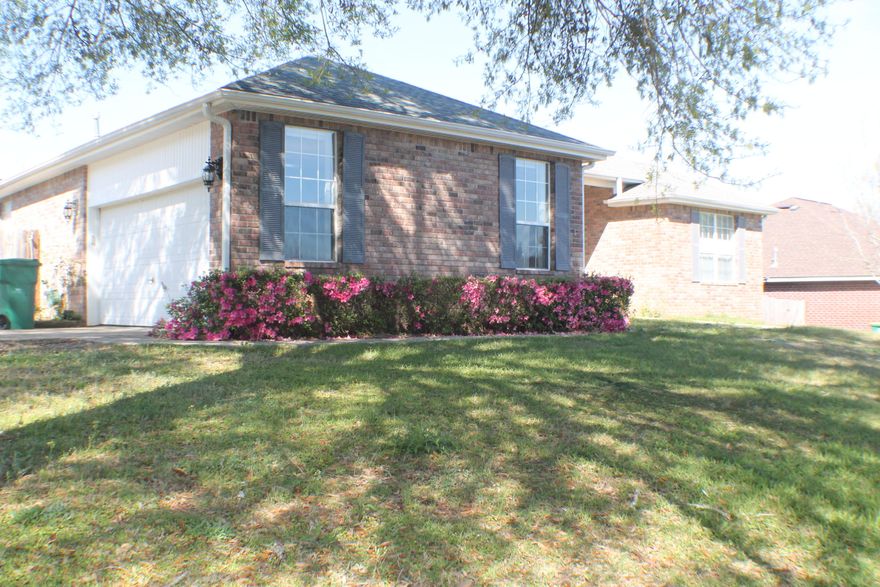 Spacious 4 bedroom 2 bath split floor plan house with large kitchen and breakfast bar overlooking the living room for a very open feel! This neighborhood encompasses a community pool and tennis court for your relaxation and enjoyment. House sits on a corner lot overlooking the neighborhood lake as well. Generously sized master bedroom and bath. Calgon will take you away in the lovely garden tub. Home also features a screened porch and fenced back yard for privacy! Come see this one today!