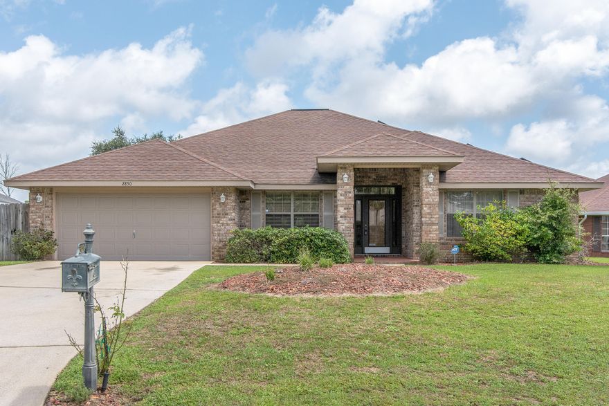 Welcome home!  You won't find another house like this one in Navarre.  Located in the quiet Waterstone neighborhood (with NO HOA!), this 4br/3ba home is just a short commute to Hurlburt, the beach, and the larger cities of Pensacola and Destin.  Inside you will find a formal dining room and a den that is perfect as an office, a playroom, or even as an in-home salon or space where you can work from home!  The kitchen has gorgeous wooden accents installed on the walls along with custom built-in shelving.  There is also a custom pot rack hanging above the large kitchen island and breakfast bar, and a pantry to provide even more storage options.  The living room is a great space to entertain and relax around the floor to ceiling fireplace.  The master bedroom and bathroom are the truly uniqu features of the home.  The term his/hers bathrooms are exactly that: two full master baths!  Each side has its own vanity, toilet, closet, and bath/shower!  Never worry about running out of counter space again!  The backyard has a screened in porch and plenty of space for a playground or urban garden with yard leftover!  There is also an above ground pool with pump to help cool you off in the summer!