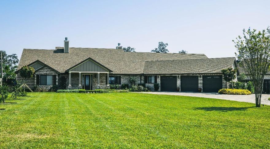 Welcome home to this beautiful custom built waterfront home built in 2018 located on Garnier's Bayou.  As you drive down Watkins Cove's private drive you will be greeted with beautiful brick pavers, mature crepe myrtle's lined all down each side of driveway after entering thru the private gated entrance.   This fabulous home offers plenty of privacy with an spacious front and back yard with fruit trees located in front yard.
As you enter this beautiful breathtaking waterfront home it is all about the view.
Every room in this home has a view of the Bayou.  This home offers an open plan that offers plenty of room for entertaining.  Two beautiful wood burning fireplaces located inside and on back porch for those cool nights.  The kitchen offers a large granite island with granite countertops. Beautiful kitchen cabinetry and spacious dining area. 
All four refrigerators, all TVs mounted convey with the home.
This home offers an mother-in law suite with a full kitchen, living room, bedroom, full bath,  laundry room with stackable washer and dryer.  This suite has beautiful views of the bayou along with a private entrance, but still accessible to the home.  As you head upstairs, enjoy watching the sunrise on the balcony with a cup of coffee.  There is a family room upstairs along with a bedroom, small office space area near the stairs for the kids homework area. This upstairs area has two separate large storage areas.  
Ready for some outdoor fun? The backporch offers an outdoor kitchen with granite countertops, mini fridge, sink area,  outdoor fireplace, heated swimming pool and dock for your boating fun.  
If you have alot of toys this mancave is the one for you.  In addition to the 3 car garage with the home there is a 6 car detached garage with a full bath/shower, TV, 200 AMP Separate power meter. The possibilities for this space is endless. Home has an 48 KW Generac Home Generator. This custom home has easy access to both military bases, beaches, and all the Emerald Coast has to offer.
Buyer to verify anything deemed important including, but not limited to lot size, room dimensions, sq footage, zoning. 
Make this gorgeous home yours today!!!