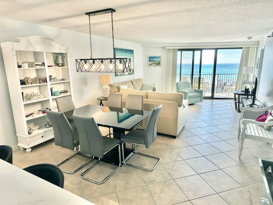 As soon as you step through the door of this beautiful 2-bedroom 2 bath retreat you will never want to leave. The sparkling blue waters of the gulf and the sugar white sand of the beaches are visible from almost every room.Owner replaced the HVAC in 2024, Heat Pump and HWH tank in April 2020.  Kitchen was updated in 2024 with stainless appliances, quartz countertops and a stunning glass tile backsplash.  Both bathrooms have been completely redone last month with all glassshowers, new cabinets, quartz counter tops, under mounted sinks, black framed mirrors and dramatic new black and white tile flooring.New bedroom and dining room furniture is on order to complete this Fantastic retreat!Call to see it today!