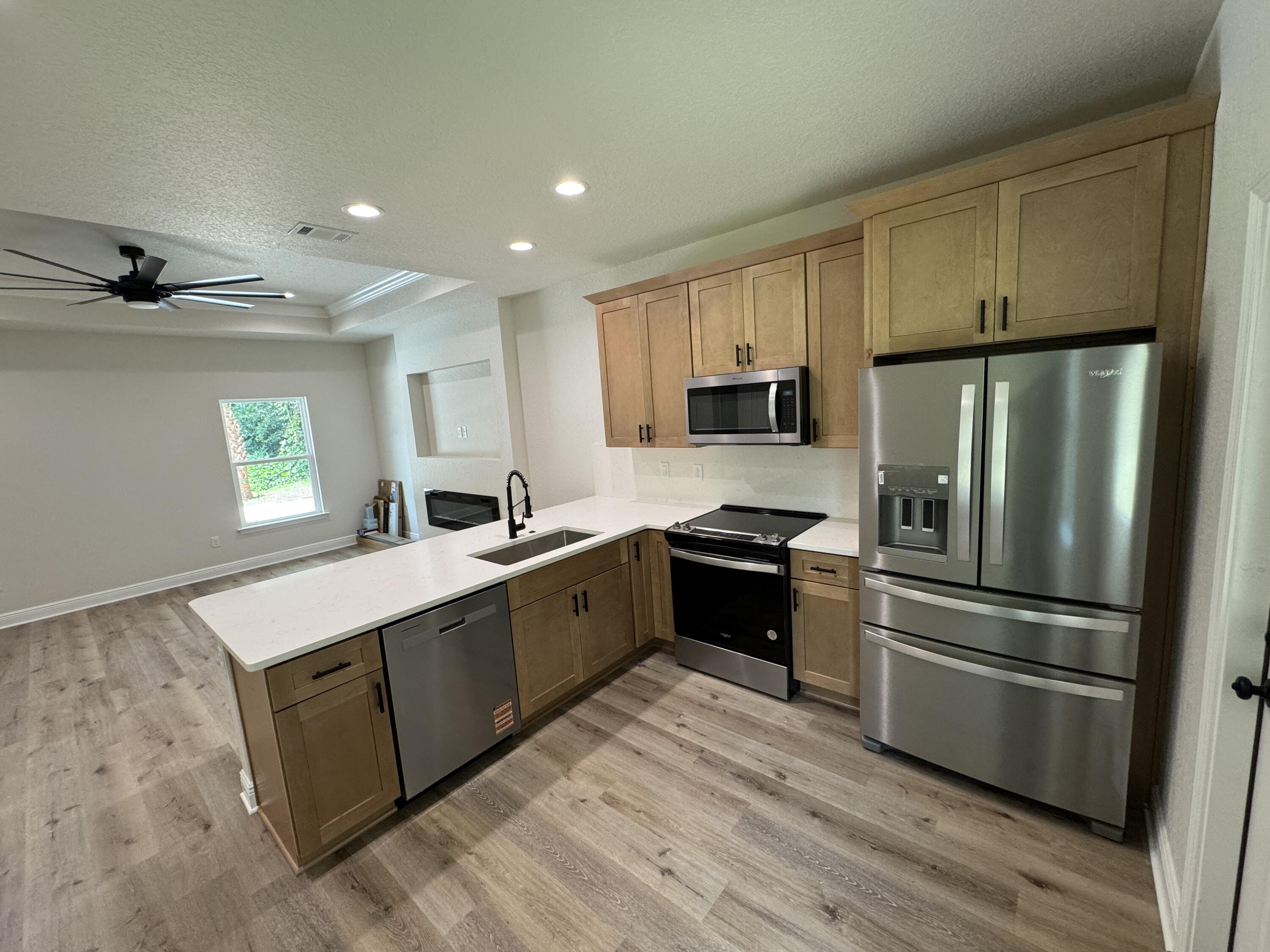 We got you covered when it comes to luxury to suite your budget! White Carrara quartz counter tops, check! Sandstone soft close wood cabinets, check! Hickory LVP flooring throughout, check! Black matte fixtures for a sleek contemporary feel, check! 9 ft ceiling with 10 ft trey up in primary suite, fenced in backyard irrigated. We've managed to pull of all the appliances including washer, dryer, fridge, 75 inch TV and electric fireplace. Home at the very end of the road thus perfect for everyone esp. pets. Less than 3 miles from downtown Crestview, 1 mile from Twin Hills Park, 8 miles from Dukefield, less than 22 from Eglin AFB and 30 from Hurlburt Field. THIS A MUST SEE! Professional pics coming soon!