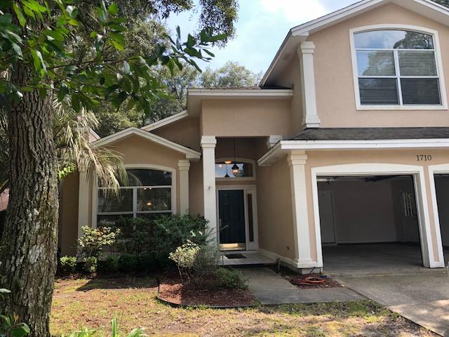 Bluewater Bay location in gated community of Parkwood Estates. Home offers a comfortable floor plan with lots of windows & natural light. Two story home allows private bedroom space on the second floor with two living areas, dining room and office on the bottom floor. Living room has gas fireplace, formal dining room has built in plant shelves while kitchen has large eat in area. Kitchen has oak flooring, granite counter tops, walk in pantry and corner window over the sink . Family room has tiled floor. Two car garage with automatic garage door opener. Fenced back yard, with sprinkler system. Owner will consider dog only, no cats.