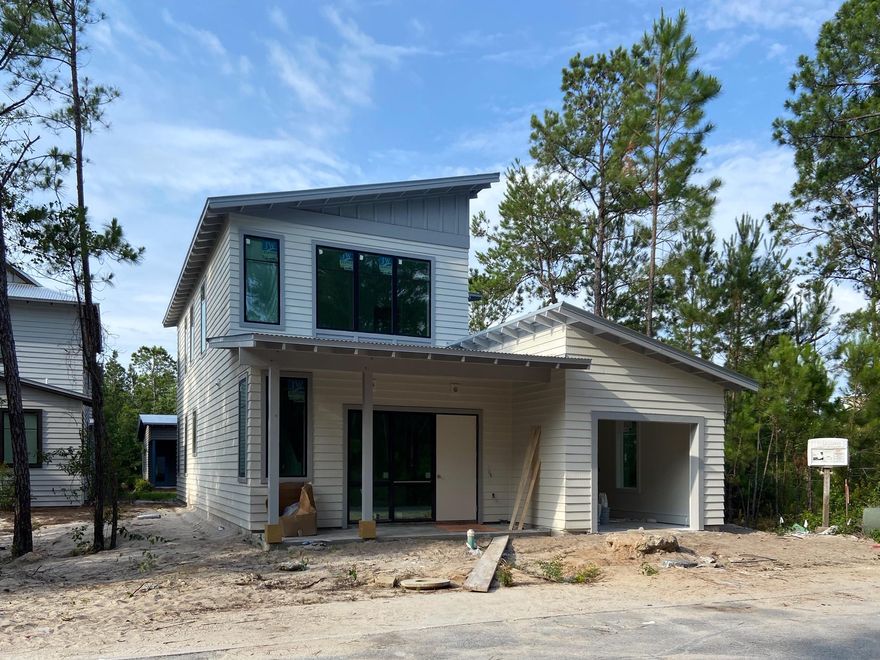 Move-in to this brand-new 4-bedroom home on Historic Point Washington by the end of June. One of largest lots.Acres of conservation ring this cozy neighborhood. High-quality construction, and Eden State Park, schools and boat launch are all within walking distance. Discover SOUTH WALTON'S NEXT GENERATION HOMES, thoughtfully designed for today's families: storm-resistant windows, metal roof, quartz countertops, stainless appliances; 2-X-6 real wood construction; soft-close drawers. Solid, safe, secure. This home has a master bedroom on the ground and second levels, as well as a garage. Come walk through Eden's Landing, as well as some of the new homes under construction.