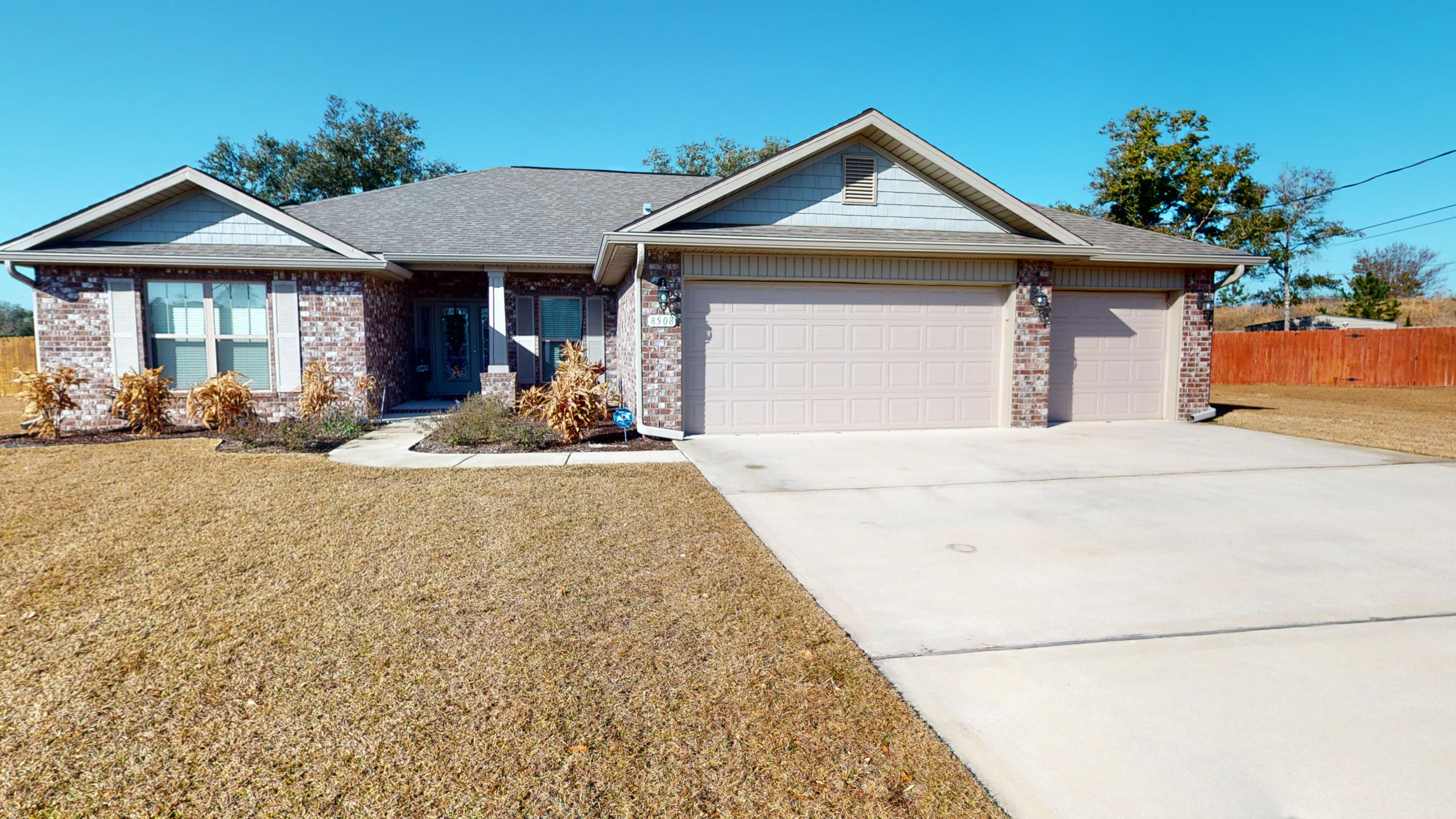 ACCEPTED OFFER WITH KICK OUT, show today! Why wait as long as nine months for new construction when YOUR NEW home is ready now! This 3 year young home offers 4 bedrooms 2 full baths and 1 half bath. The open split bedroom floorplan includes a flex room that can be used as an office, playroom or den, plus family room and breakfast room (cafe on floor plan) that both open to kitchen. Stainless steel appliances, granite counter tops in kitchen, cultured marble in baths, with 22 inch tiles throughout the home, Full brick exterior, 3 car garage, SOLAR PANELS (fully paid for), privacy fenced 1/2 acre lot, lawn, pump, sprinkler system and screened porch with slate tile. Minutes to the white sugar sand beaches of Navarre, shopping, and Hurlburt Field. Can show today so why wait for tomorrow