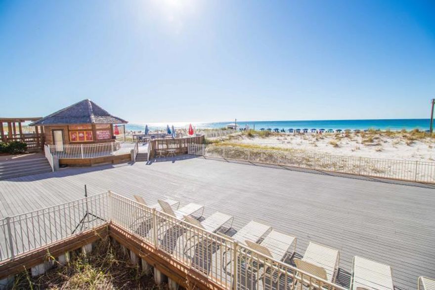 Fantastic Views from this first floor direct beach front location. Convenient to everything! Pull your car up and walk into the unit. Best price in Pelican with updated granite and cottage cabinet doors in kitchen. Breakfast bar for extra seating. This location provides easy beach access with no long elevator wait time. Kids love the built-in Bunk Beds. Amenities include 3 swimming pools, indoor/outdoor heated pool, cafe, tiki bar, tennis courts, community rooms, spa, sauna and covered parking. Call me to show.