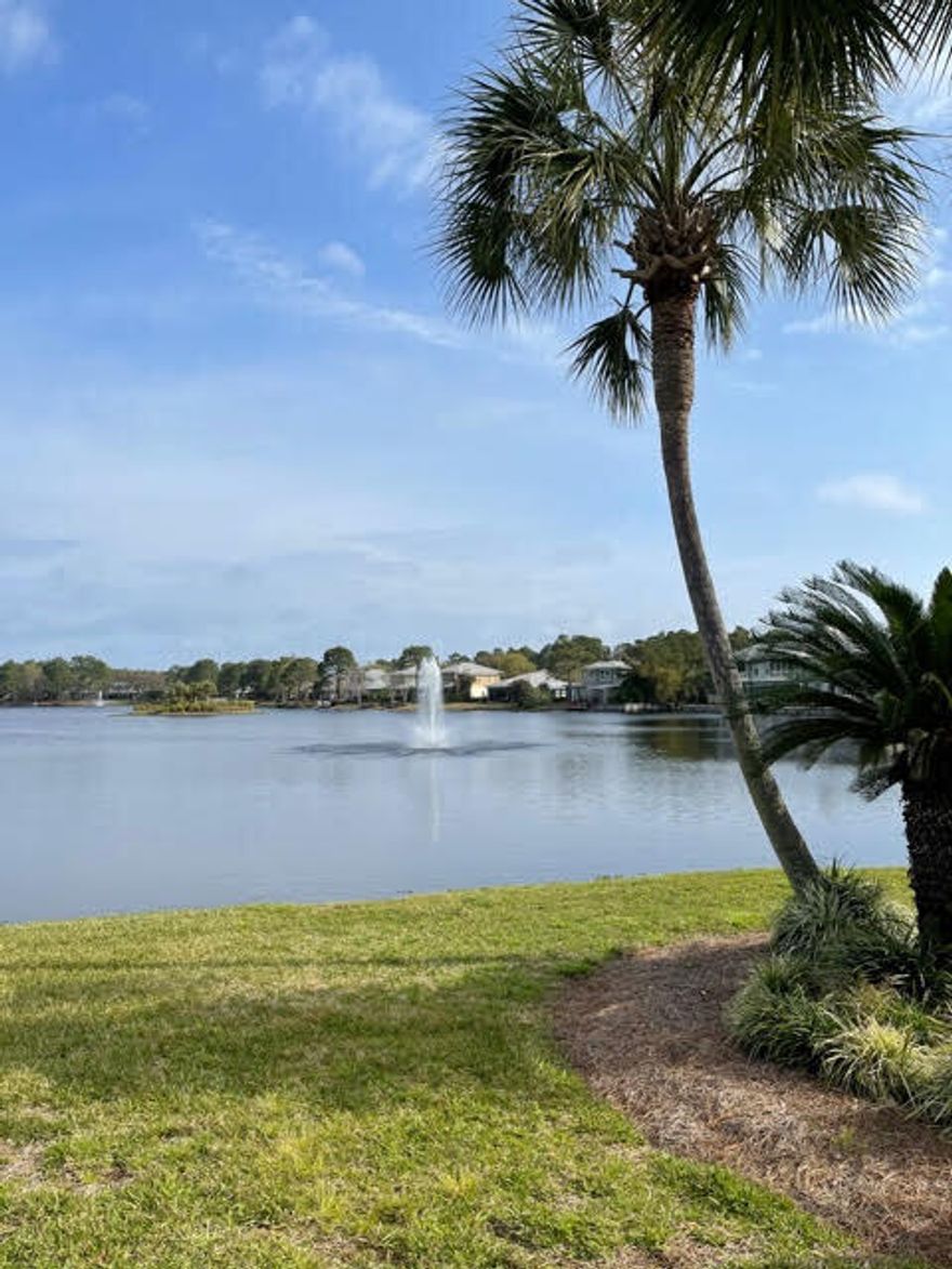 Sandestin resort living for only  $259K.   Nice first floor condo with the living and dining areas both open out to the large covered porch overlooking protected woodlands. The kitchen features stainless steel appliances, corian countertops, breakfast bar, and tiled backsplash. Other finishes throughout the unit include 9 foot coffered ceilings, crown molding, and tile throughout the living areas. Unit is being sold fully furnished and turn key. Schedule your showing today and start enjoying the Sandestin lifestyle!