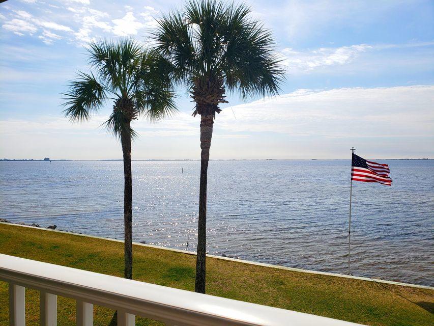Tenant occupied until 2/28/22. You'll love the views that this upstairs, waterfront unit has to offer. Located along Choctawhatchee Bay in a gated community, the floor plan incorporates 2 bedrooms, 2 full baths, of which the master features a garden tub. Wake up or wind down while watching the sun set and rise over the water on your private balcony.. Well maintained complex includes pool, sauna, clubhouse, laundry facility, and lighted tennis court.