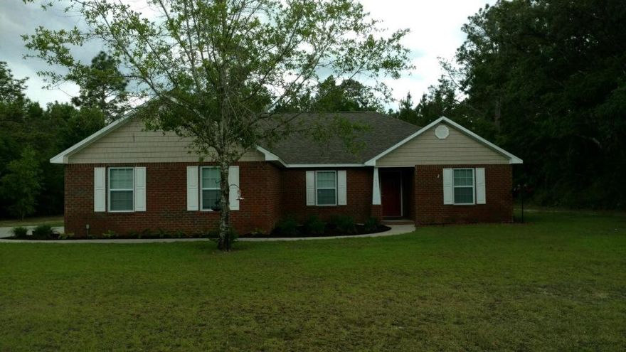 Beautiful All Brick home in Ashtin Estates, a lovely, level subdivision with underground utilities and 1/2 acre, shaded lots! - Great plan - Open LR, Dining, and kitchen - Cathedral Ceiling in Living Room. Other Ceilings are 8 feet. Maple Cabinetry with raised panel doors, granite counter tops, and Black appliances; tile flooring in Baths, Laundry, kitchen and Dining area; Laminate in LR,Carpet elsewhere. Master Bath awesome! Large Garden tub, marble vanity tops, large walk-in closet. Covered Patio. This lot is level, 1/2 acre has beautiful hardwood trees. AND - get those kids (and adults) outside to utilize a custom designed, quality built,physical fitness/obstacle course!! See Photos - unique! This is a Jay Terrell Home - Quality, Local Builder with a reputation for