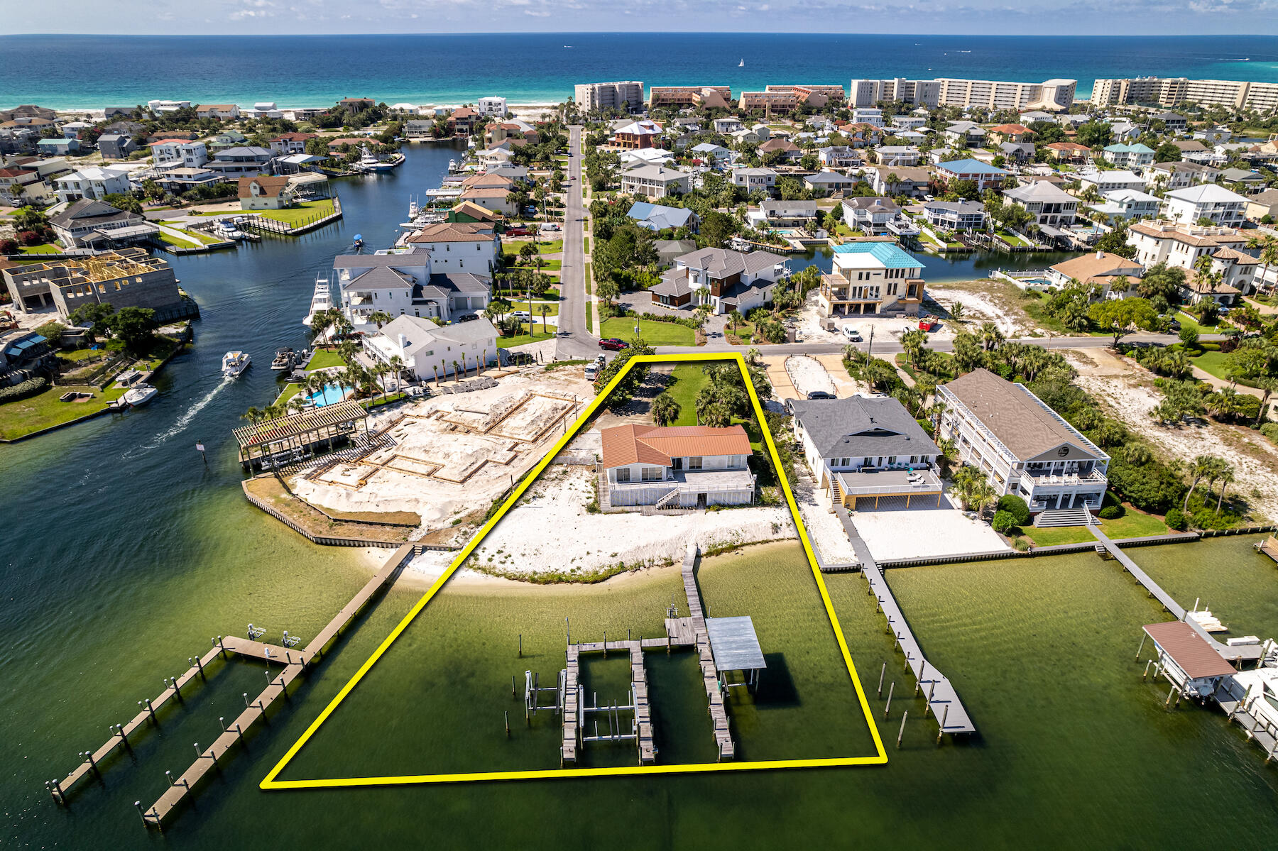 Approximately 149' on the Destin, Florida harbor! This superb, deep-water lot offers a perfect redevelopment site on which to build your custom, generational dream home. This rare offering represents one of the most coveted waterfront lots in the entire resort community of Holiday Isle, which offers residents access to multiple beach walkovers, one of which accommodates golf cart parking. Holiday Isle also is convenient to the areas most desired shopping and restaurants; some accessible even by boat taxi! Please inquire for further information, and to coordinate a private showing.