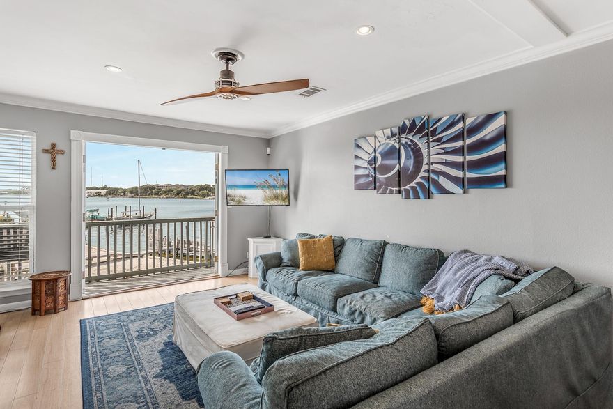 Gorgeous direct Intracoastal Waterway front 3 bedroom, 2.5 bathroom condo located in Commodore's Landing on Okaloosa Island! Remodeled & updated split level unit boasting 1,260 sq. ft. on the 2nd floor featuring beautiful Intracoastal Waterway views from the deck which is easily accessed from the living room and master suite balconies. The waterfront master suite features a queen bed, a remodeled en suite bathroom, and a private balcony with water views. The guest bedroom offers a queen bed and a private bathroom with a shower/tub combo. There is an additional guest bedroom in the adorable private loft area. This condo is ideally located on the desirable Okaloosa Island, just a short walk away from the pristine white sand beaches and local eateries and outdoor activities.