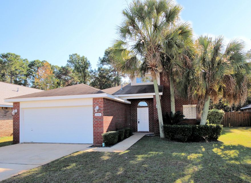 ''Location, location, location'' This charming house offers 4 bedrooms and 2 1/2 baths, wide open floor plan, three of bedrooms upstairs and the master down. The kitchen includes all matching stainless steel appliances and a large island with a breakfast nook and extra cabinets. Off the great room, through French doors, is a glassed in Florida room that easily serves as a sunroom playroom workout room or man cave. Covered grill deck for BBQ. Very close to both Hurlburt AFB, Eglin AFB, beaches,golf courses, mall, superstores and schools. Freshly painted inside. Also house comes with Hurricane shutters.