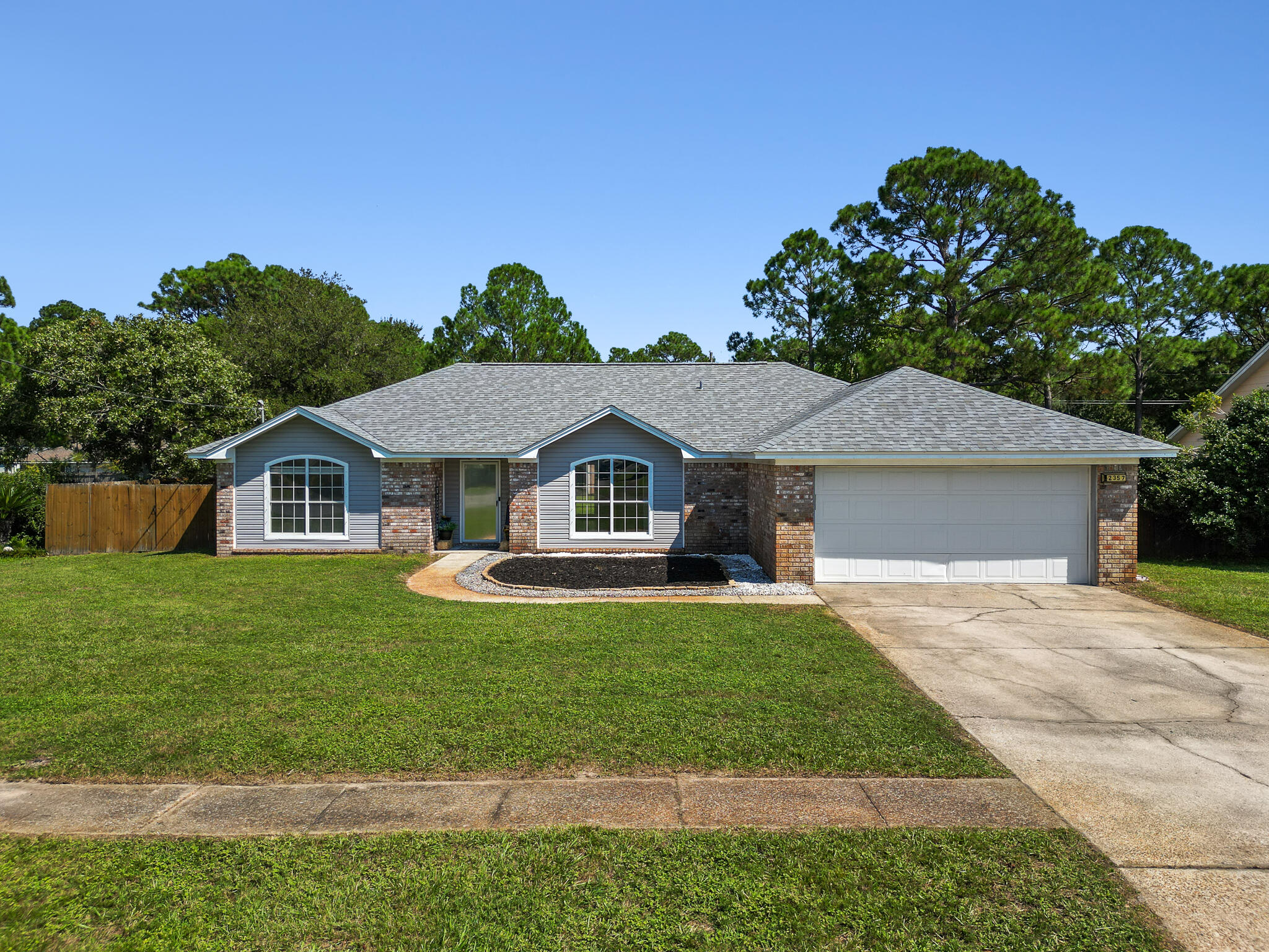 Updated and clean 3BR/2BA home on 1/4 acre in the heart of Navarre. Relax or entertain in the large open living area and updated kitchen with stainless steel appliances and granite countertops, or take it outside in the huge fenced-in yard with covered patio and detached storage shed. The split floor plan is a great feature, and the formal dining area can easily be transformed into an office or play room. With no HOA, you have space to park your outdoor toys and still close enough to all the shopping, schools and beaches in Navarre. Whether you're looking for a family home or your next investment, make an appointment and ensure this property is on your ''must-see'' list!