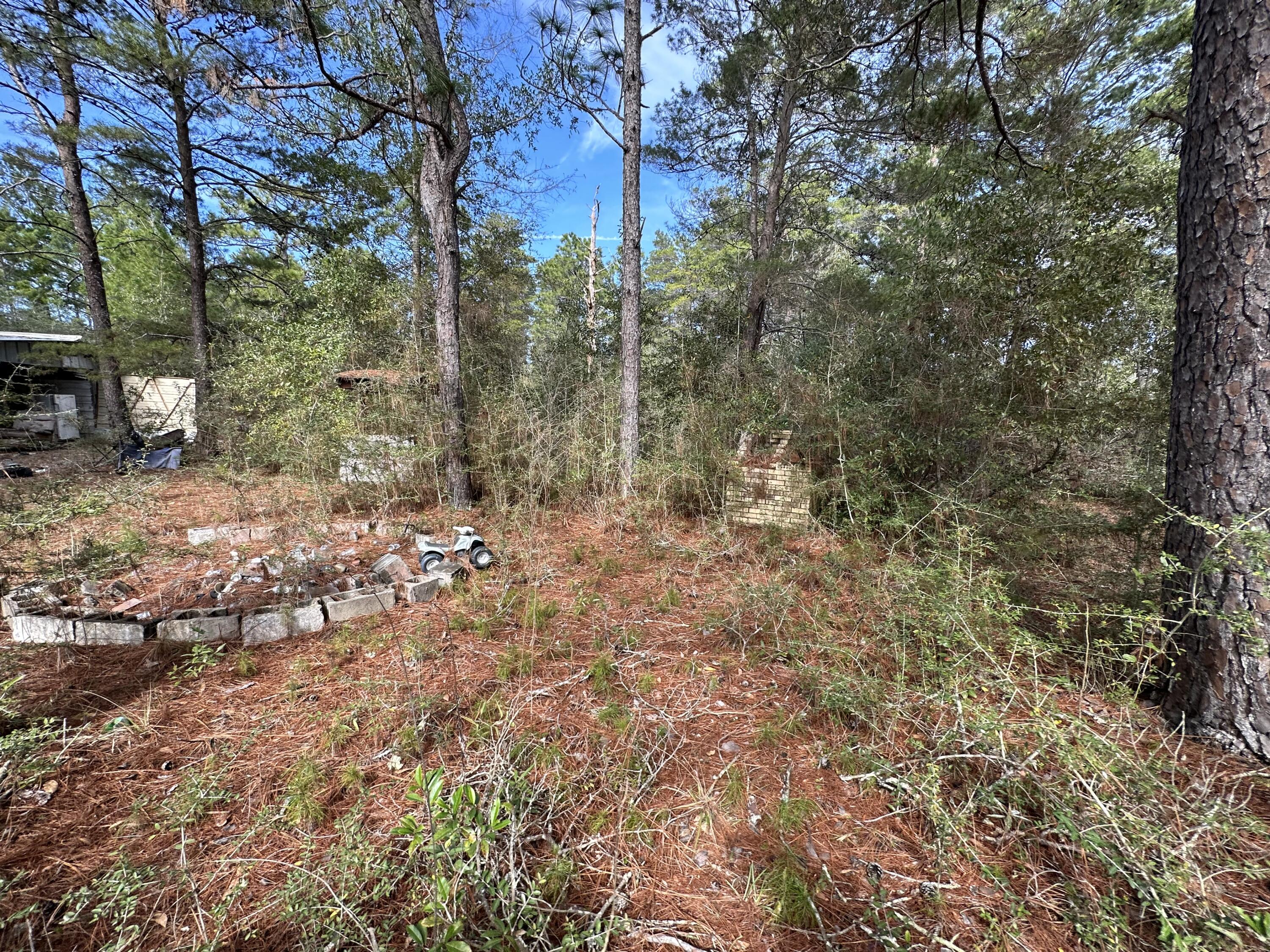 WOLFORD ACRES - Land