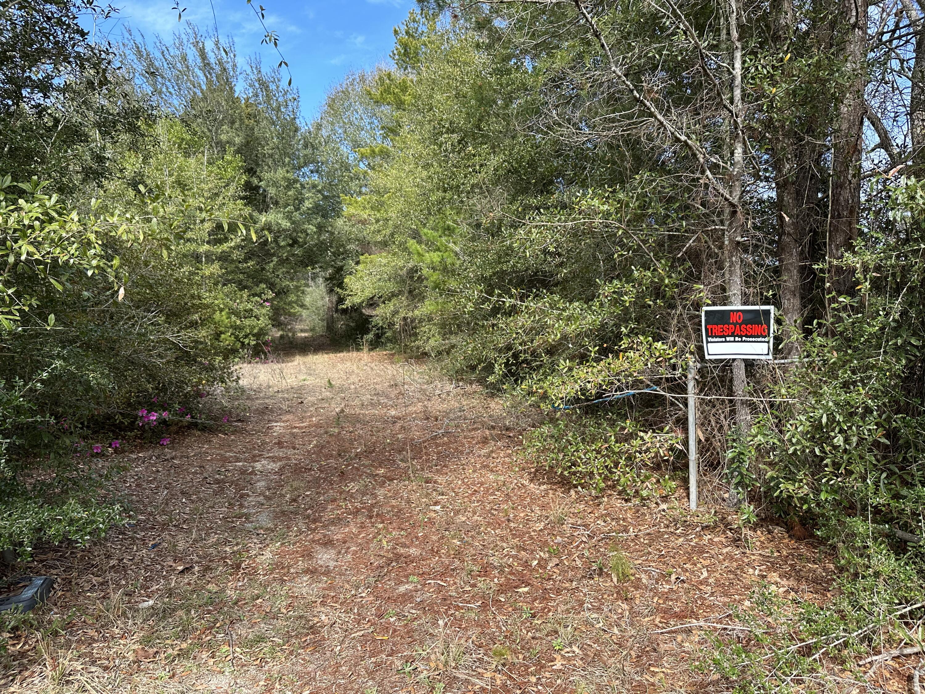 WOLFORD ACRES - Land