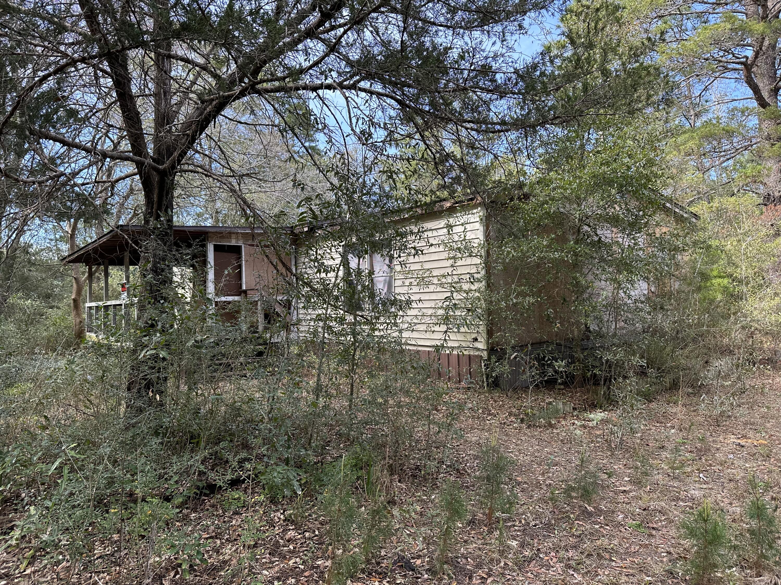 WOLFORD ACRES - Land