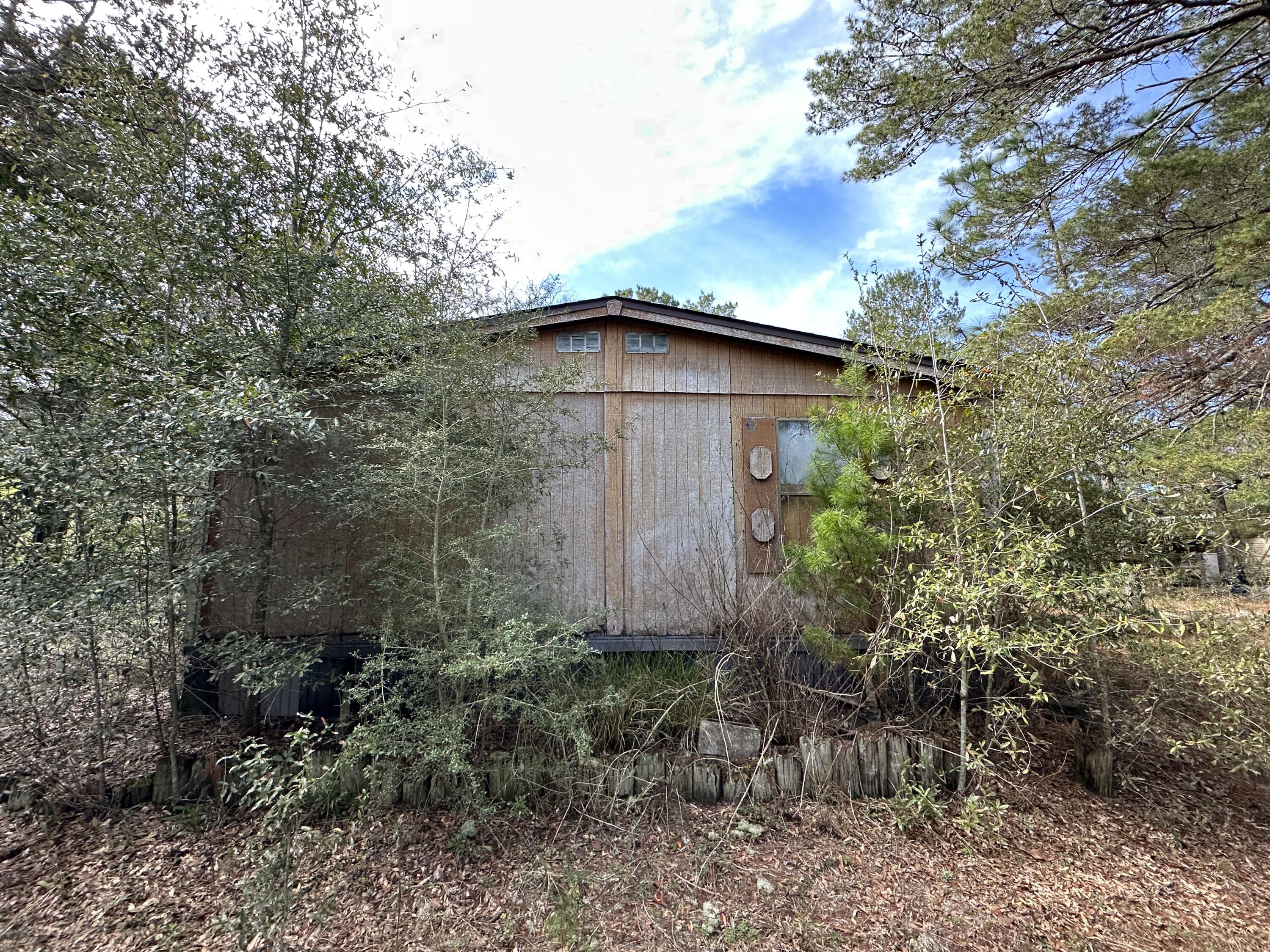 WOLFORD ACRES - Land