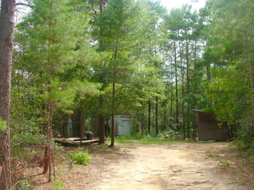 5 acre parcel, consisting of three lots. Lightly wooded with a creek running through the middle. There is a well and power pole on the property