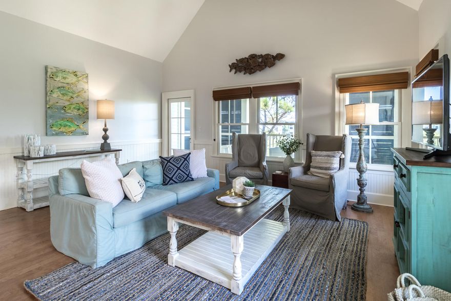 Located in the heart of Watercolor directly on 30A, ''Gulf Glimpses'' is the perfect get-a-way or rental property. Perched three stories above the world-renowned seaside enclave - home to a private beach, stunning pools and gourmet restaurants - this corner unit features gulf views, an open, lofty floorplan, a wide southwestern exposure allowing an abundance of natural light, and numerous updates. The main floor features a soaring great room with passage to the large, south facing covered porch, a gourmet galley kitchen with breakfast bar, a spacious en-suite master and a convenient powder room. Overlooking the great room is an open loft space great for kids or extra guests, currently configured as a media room with a pullout sofa. This is an unforgettable unit in an unbeatable location.