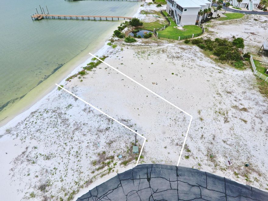 REDUCED $120,000. WATERFRONT lot located on the Santa Rosa Sound with 50' of waterfront footage. Located in the premier gated community of Caribbean Isle with community pool, tennis courts, street lights and underground utilities. This lot offers the best of both worlds, Water frontage on the Santa Rosa Sound with your Own personal White Sandy Beach that gives you easy access for fishing, boating, kayaking, paddle boarding and other water sports. Beautiful beaches of the Gulf of Mexico are just 2 mins away. Build your dream home on this 8300 sq ft lot and make memories with countless sunrises, sunsets and relaxing days on Your Beach. The seller has recently added a substantial amount of sand and is in the permitting process to build a seawall. Click on ''more'' for additional info. Navarre Beach is one of the last places with the old Florida feel. Crowd free beaches, Emerald green waters and miles of sugar white sandy beaches, walking & biking trails, a fishing pier, Gulf Island National Seashore to the west and county owned park to the east for ultimate in privacy and leisure.