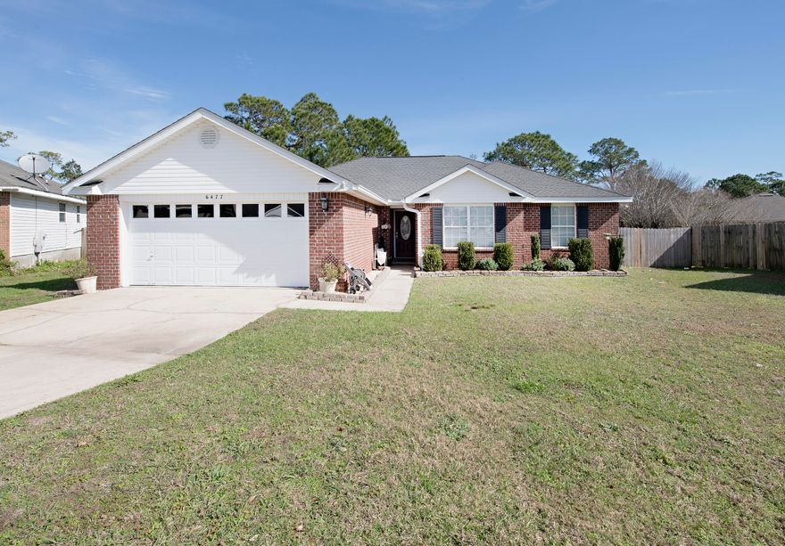 As you step inside this beautifully renovated home, you will be in awe of the upgrades! This home features laminate flooring all throughout with no carpet! The kitchen has stainless steel appliances, white cabinets, and a contemporary backsplash. The living room has a modern tiled fireplace. The bathrooms have granite countertops and tiled showers. The master bedroom is spacious and has its own access to the back porch. The backyard is spacious with plenty of space for entertaining. This immaculate home will not last!!