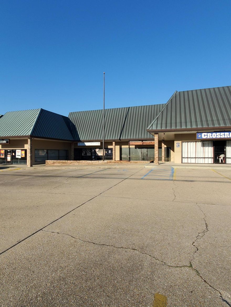 FABULOUS LOCATION!!! In the heart of the activity, this 1800sf unit boasts 1 reception office/area, 4 offices with doors, 1 conference room, 1 kitchen and 1 bath. Great visibility!!  Located one block South of Sam's and Wal Mart, this well maintained center has a well-rounded group of commercial customers that will help to enhance any business.