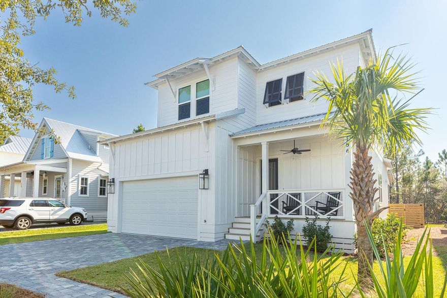 Steps from the bay and minutes to the beach, this impeccable four bedroom, three and a half bathroom home checks all the boxes! Completed in 2022 with upgraded interiors, 106 Marlberry Trace still has the luster of new construction but none of the kinks. Enjoy serene privacy in this gated community with a lot that backs up to a state preserve. Fresh paint and lighting throughout, plus a new kitchen backsplash and open shelving. Highlights include a two car garage, irrigation system, main floor master suite with a custom walk-in closet, screened-in porch, paver patio, large walk-in pantry, lap siding accents, side privacy fence, new refrigerator, electric fireplace, under the stair storage, upstairs bonus area,