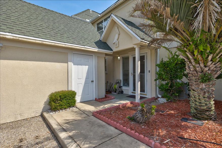 Back on the market! Buyer walked because there are NO short term rentals allowed in this complex.  Because of the location, this well kept townhome could be perfect as a permanent residence or for an investment!  Owner is being transferred and must sell. Many improvements have been made in the short time he has owned it.  AC has been aero sealed and vents have been cleaned to prevent any mold entering the home.  Video door bell has been added as well as all new ceiling fans, and LED lighting throughout.  The garage has been painted and the garage floor has been sealed.  New tile in the guest bathroom. One car garage and attic for storage PLUS extra outside parking space for this unit.  Hardwood floors in the living and dining room.  Open floor plan downstairs with wet bar.