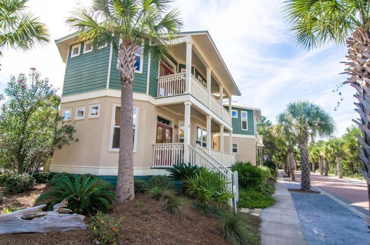 This awesome house, also known as the Big Bamboo, boasts 6 bedrooms and 5 1/2 bathrooms that can sleep up to 16 people due to the separate carriage house which is RARE to find in Seacrest Beach!This property is perfect for a very large family or two/three families to share.The first floor is covered in hardwood with a spacious living area for all to enjoy. Each bedroom is complimented with brand new carpet and will be sold fully furnished. There are porches galore on this home! A balcony is accessible from almost every room in the house. The very top floor resembles a loft with a large balcony looking out over the neighborhood, tree tops, and gorgeous skyline! A great addition to this property is the one car garage so you can store your golf cart and extra beach gear with plenty of room