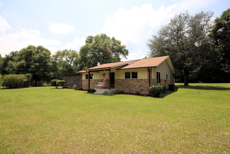 A great 3 bedroom 2 Bath home with separate Mother in law suite (to include kitchenette) AND acreage! ALL South of I-10! Move-in-ready! Main house features a Living Room, a den with gas fireplace, and Bright Kitchen and Dining area. Lots of upgrades and new items to make this home easy to own and light on the wallet, New High E Argon double pane windows, New carpet, New Roof (12), new bathroom fixtures (12), HVAC (08/'13), Water Htr (12 Main, 13 apt). Property includes small two stall barn and corrals, and a 23 x 20 separate garage and workshop, with additional covered storage for a boat, tractor, and toys!