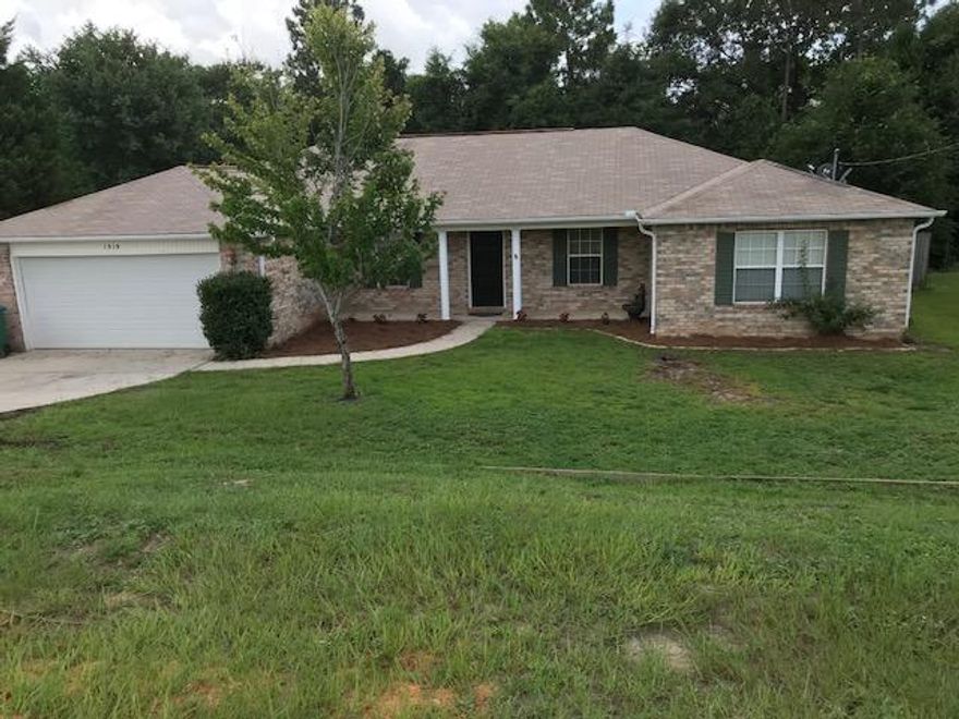 LARGE HOME SOUTH OF I-10---CONVENIENTLY LOCATED FOR COMMUTERS !!! Freshly Painted!SELLERS WILL CONTRIBUTE UP TO $3,000 TOWARDS BUYERS CLOSING COSTS.This spacious all brick 4 bedroom 2 full bath home features a split floor plan with a formal living room and dining room. The home has laminate wood flooring throughout living areas and tile in all wet areas. The master bathroom has 2 walk-in closets with a double vanity and a garden tub with separate shower. The kitchen features an island and breakfast nook. The home has a privacy fenced back yard with a nice out building for additional storage. Agent to verify all measurements to their satisfaction. SELLERS will provide an AMERICAN HOME SHIELD HOME WARRANTY valued at $400.