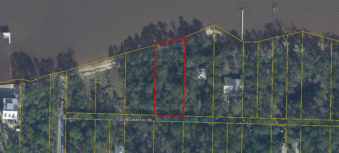 This is a double heavily treed lot with 100 feet of Bay frontage. Short drive to the beautiful beaches of South Walton. Build a dock and keep your boat right there and enjoy all the pleasures of boating on the Bay.