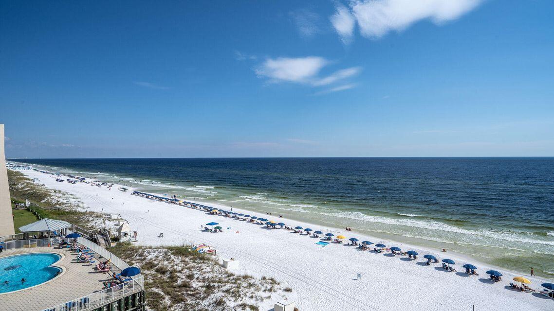 Incredible opportunity to own a fantastic 2-bedroom unit at the Beach House!  Spacious and well equipped, this condo offers updated kitchen and baths, plantation shutters, outside storage unit, and tile thru out living area. This condo is turnkey, fully furnished and rental ready. From your second-floor balcony you have incredible views of the Gulf of Mexico! This low-rise building is a hidden gem on the Emerald Coast consisting of only 106 Unit on 650' of beach front. Great location-close to shopping dining and all our beautiful area has to offer! Dimensions to be verified by buyer.
