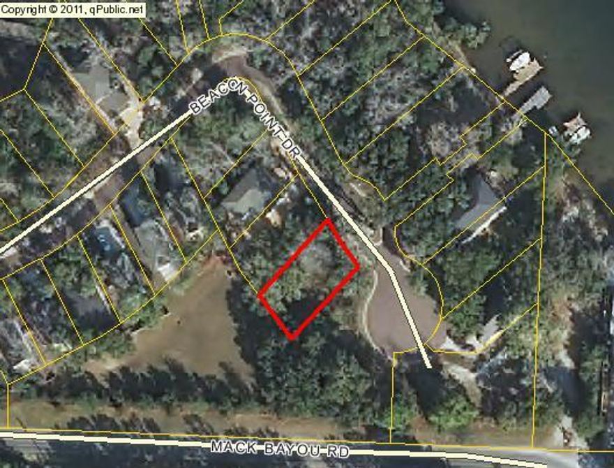 This lot is located in Sacred Oaks, a new neighborhood located on the beautiful protected deep waters of Mack Bayou. This lot is unique because it has great bay views over the community boat dock area with no home to obstruct the view. Sacred Oaks subdivision, on 16 acres of land, is nestled among 100 year old oak trees and offers an exclusive lifestyle in a quaint subdivision with heavily landscaped lots ensuring quiet tranquility for years to come.