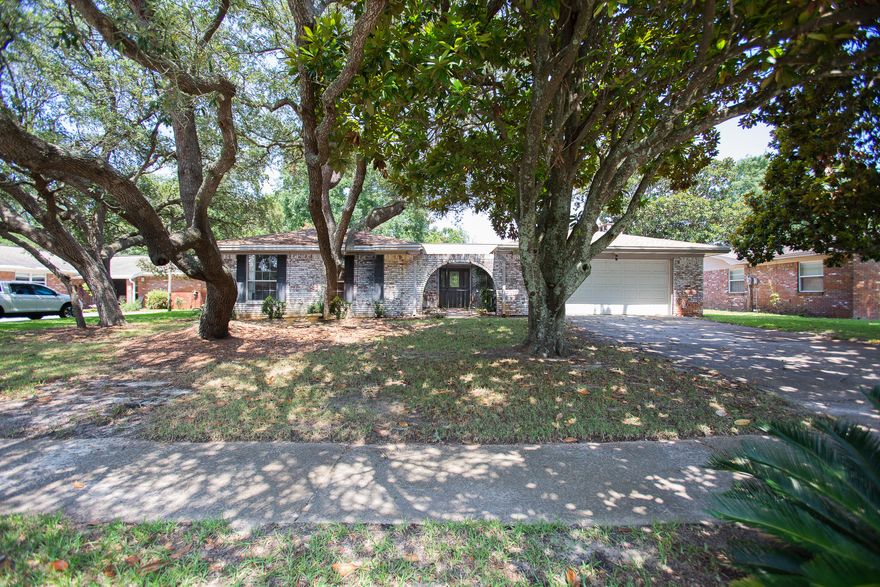 Just reduced price .Brick home with a private courtyard.Well maintained 4 bd/2ba home.New roof,carpet and paint in 2016.Open floor plan. Kitchen opens up to the dining/living area and den.Open and covered patio with fenced in backyard.Sellers just spent $6,000 on electrical upgrade. Neighborhood conveniently located near area shopping and dining.Room dimensions and square footage to be verified by buyer.