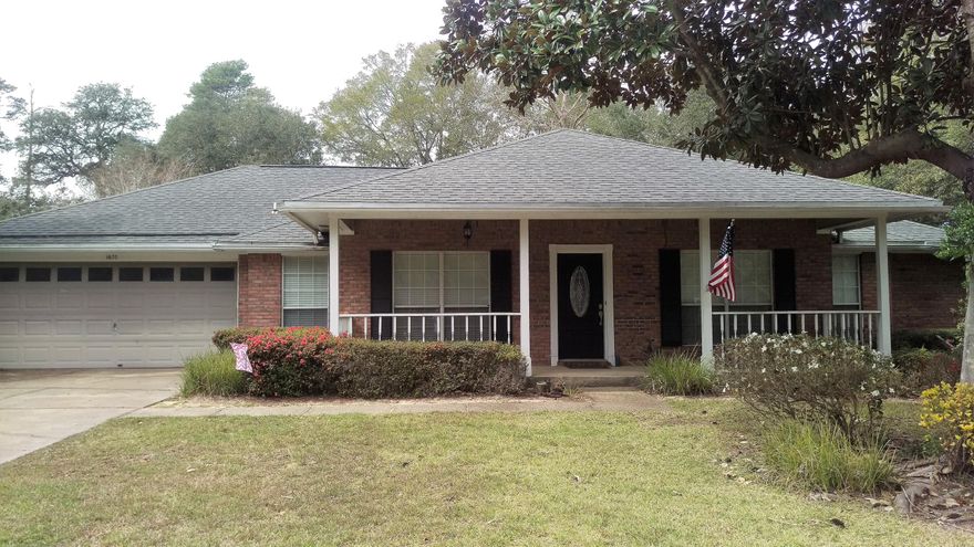 Enjoy the privacy of a gated community in an established neighborhood. Check out this great three bedroom home with an office located in Bluewater Bay's popular Parkwood Estates. This gated neighborhood offers privacy and a lovely community environment. The formal living room and dining room both feature beautiful crown molding. The large family room has a gas fireplace and built in bookcases to showcase your library and provide a place to relax with the family, while the split bedroom floor plan gives you privacy when you need it. And when you really need to relax, try the spacious garden tub in the master bath. The home backs up to Fred Gannon State Park, giving the backyard a very natural feel. The covered front porch lets you enjoy summer days outside without the sun. Click more now