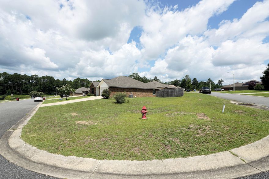 A lovely 4 bedroom, VA Assumable, brick home on large, fenced, corner lot, '19 build & no flood zone equaling low home owner's insurance. On a cul-de-sac w underground electricity, this home is located off Hwy 85 near Hwy 10 & Duke AFB. Open floor plan1 & island in the kitchen creates an ideal setting for entertaining. Stainless steel appliances, light and neutral colors featured with matching granite countertops and white cabinets throughout the home. Primary bathroom equipped with a tub and separate shower with double vanity. Seller offering assistance with closing costs, several $1,000 to buy down your interest rate, a survey and home warranty. Your forever home or investment property awaits by crystal clear beaches, new eateries, pickleball and state parks. Welcome to The Emerald Coas