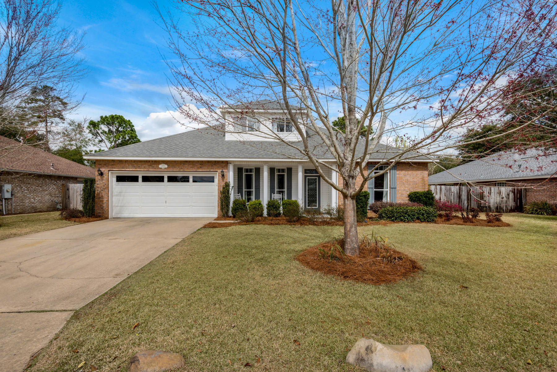 Close to perfect this recently renovated 4 bedroom, 2.5 bathroom, 2387 sqft home located in the highly desirable gated community of Parkwood Estates within walking distance to Bluewater Bay Elementary school. The covered front porch with columns welcomes you into the light filled foyer to the open floor plan that has an easy flow. The master suite is off the living area and features a magnificent master bath consisting of a separate shower and soaker tub. The master walk-in closet is 5'8'x10' for plenty of storage. Also on this wing is a half bath and bedroom #2 with it's own walk-in closet of 5x4. Two living spaces with give you plenty of room to spread out. Upstairs find the roomy loft landing which can serve any number of uses office, play area, zen den...and bedrooms 3 and 4. Each bed