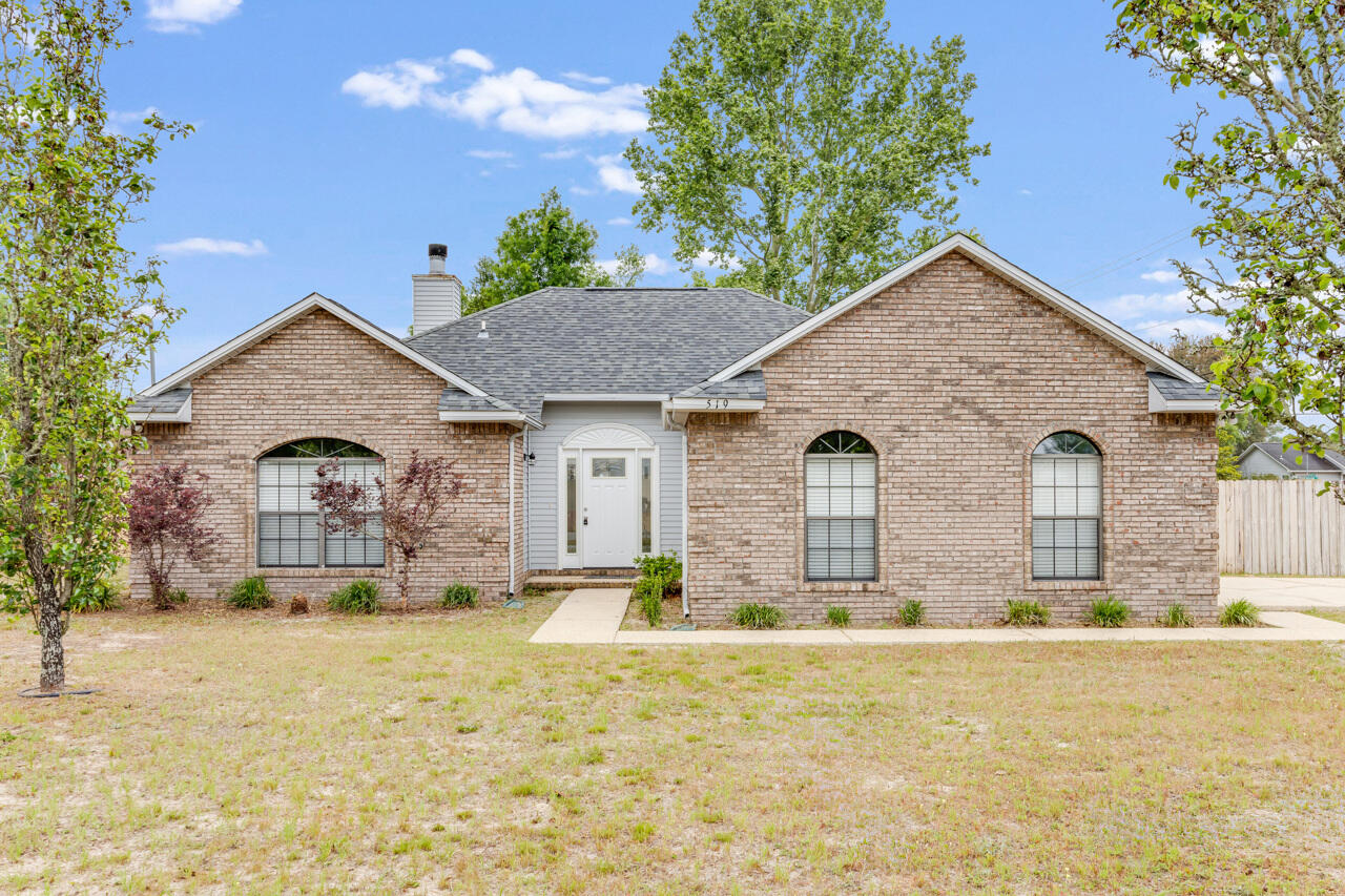 This brick home, located in south Crestview is perfect for first time or down sizing home buyers. The home features a 2 car, side entry garage, privacy fence, large flat lot, covered rear porch, laundry room, split bedrooms, open floor plan design, fireplace, and vaulted ceiling in the family room. The kitchen has wood cabinets, all appliances, a pantry closet, and an eat in area. The master bathroom has a double vanity, closet, bathtub, and separate shower. The flooring is all tile in a neutral color. This home has been loved by one family since it was built. A new roof was put on in 2018. No HOA in this subdivision.