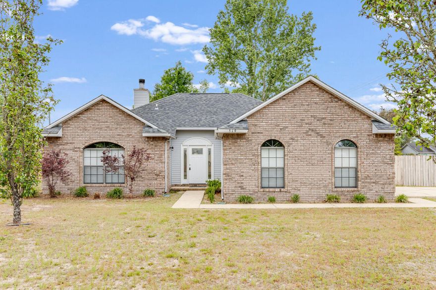 This brick home, located in south Crestview is perfect for first time or down sizing home buyers. The home features a 2 car, side entry garage, privacy fence, large flat lot, covered rear porch, laundry room, split bedrooms, open floor plan design, fireplace, and vaulted ceiling in the family room. The kitchen has wood cabinets, all appliances, a pantry closet, and an eat in area. The master bathroom has a double vanity, closet, bathtub, and separate shower. The flooring is all tile in a neutral color. This home has been loved by one family since it was built.  A new roof was put on in 2018. No HOA in this subdivision.