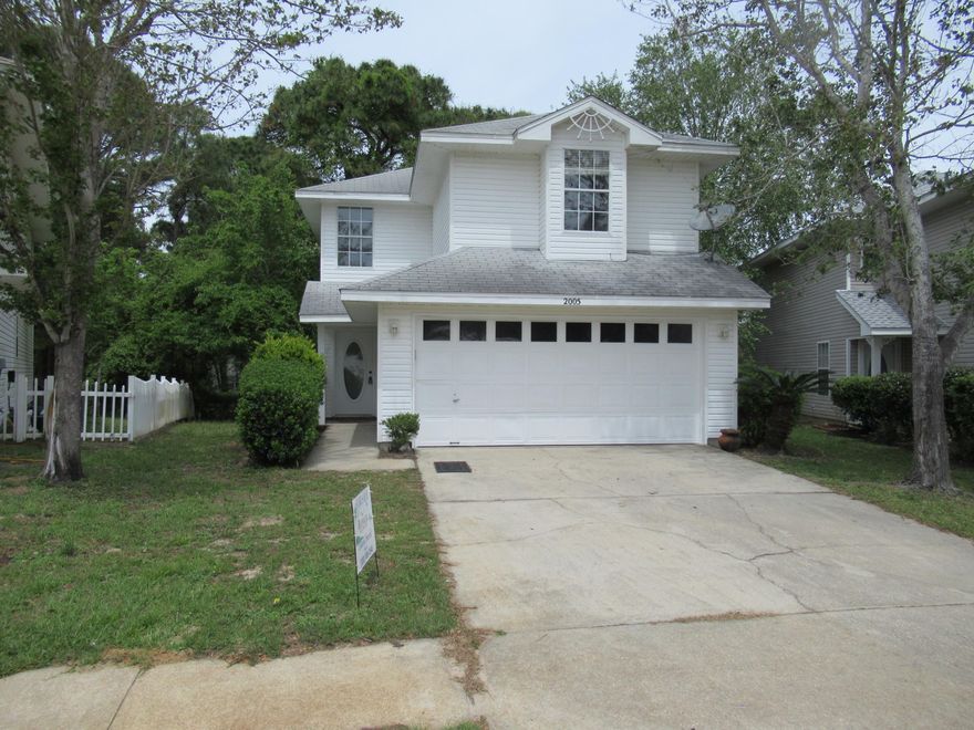 Located in the heart of Destin This home feature 3 Bedrooms 2 and a 1/2 bath. Screened in back porch overlooking lakes and dune area, 2 car garage, laundry room. All bedrooms upstairs. Refrigerator, washer included. Heating and AC units have been replaced in the past year. Freshly painted. Move in ready. Subdivision features walking paths, family recreation, playground , pavilion/Gazebo. Great location, close to beaches, shopping everything you love to do in Destin.
