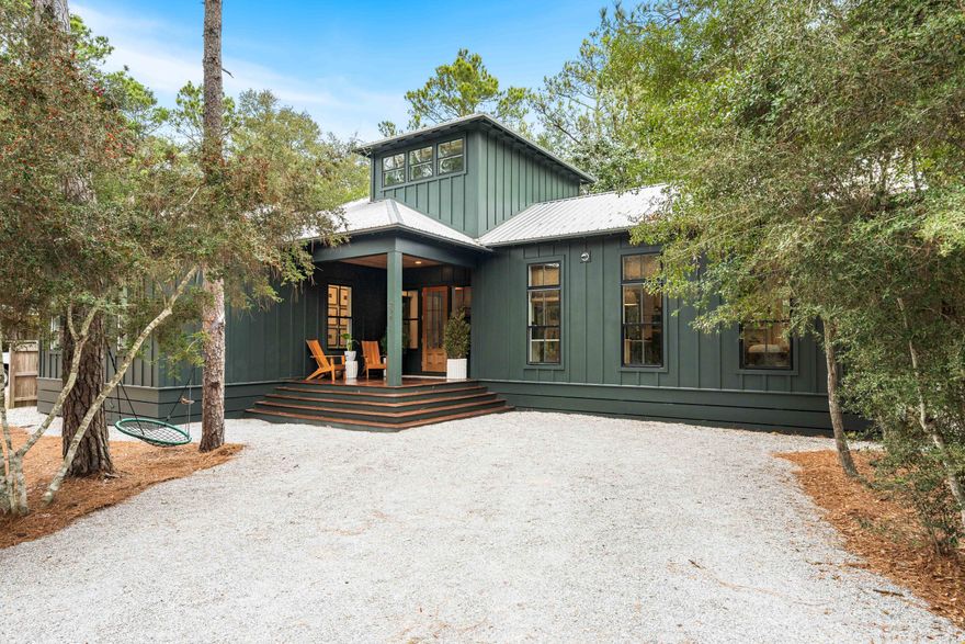 Welcome to simplified coastal living at 294 West Point Washington Road in Santa Rosa Beach, FL. Tucked among mature trees and set along a peaceful canal just minutes from the emerald waters and white sands of the Gulf, this custom home blends modern style with laid-back waterfront vibes. Step inside to an elegant, open layout designed for both everyday life and seamless entertaining. The kitchen offers sleek finishes, custom cabinetry, granite countertops and high-end appliances, making it perfect for cooking daily meals or hosting friends and family. The living space is filled with natural light and relaxing water views, creating a serene, airy feel throughout the home. Slide outside to the screened porch for morning coffee or unwind in the spacious outdoor area gathering around the firepit or chilling on the dock. With warm hardwood floors, a modern, functional kitchen, and stylish bathrooms this home feels fresh, elevated, and totally move-in ready. Don't miss the opportunity to call this one your own.  