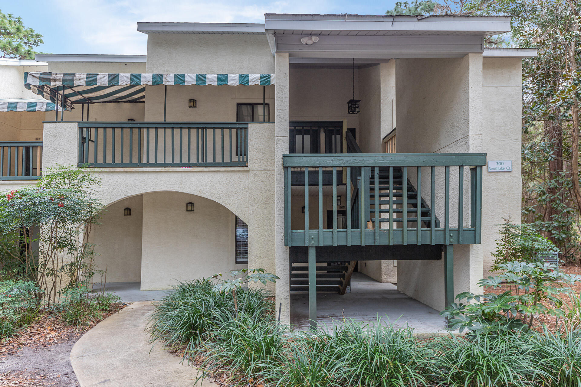 FINALLY, a beautifully furnished and remodeled spacious Bluewater Bay condo has hit the market!! Not only has this been renovated exquisitely, but this unique opportunity has gorgeous views of the lake & is also a ground floor end unit for your convenience! This home has a desirable split floor plan with an open concept to include an amazing master bedroom suite and a large spare bedroom with a jack and Jill bath perfect for your guests! The kitchen boasts granite counters, and newer slate ss appliances with an inviting snack bar. The entire unit has updated recessed lighting, LVP flooring, new paint, and beautifully renovated bathrooms with walk in showers! This really is a 'one of a kind' unit that's a must see for yourself to really grasp the beauty& details of all that it entails. Between the prime location near Bluewater Bay's Marina and LJ's Schooners restaurant (a favorite local gem) top notch schools, pristine emerald coast beaches, Eglin AFB, shopping and the overall beauty of the decor and unit itself, you will not be disappointed!
