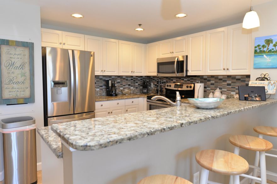 CHIC COASTAL DECOR WITH ALL OF THE UPGRADES! GROSS RENTAL INCOME OF $32,000 IN 2015! This two bedroom, two bath condo at Sterling Shores has been completely renovated! The kitchen sports white cabinets, granite, stainless steel appliances, & a beautiful backsplash. The floors are tile & the furnishings & accessories are just what you would expect at the beach. This condo is located in one of the most desirable complexes in Destin. Sterling Shores is a gated complex in the heart of Destin featuring 400' of deeded beach, a 4300 sq ft heated lagoon style zero-entry pool surrounded by spacious sundecks, & a beachside pool. The Back Porch restaurant, one of Destin's most popular beachfront restaurants, is just steps away. Other amenities at Sterling Shores include a fitness center with